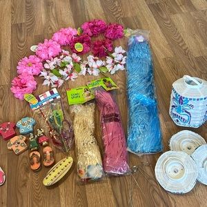 New Luau party decorations and grass skirts leis